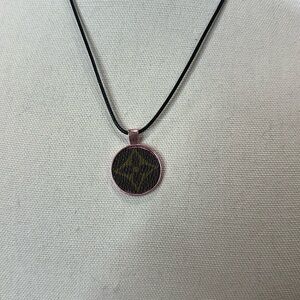 Necklace with upcycled Louis Vuitton monogram charm
